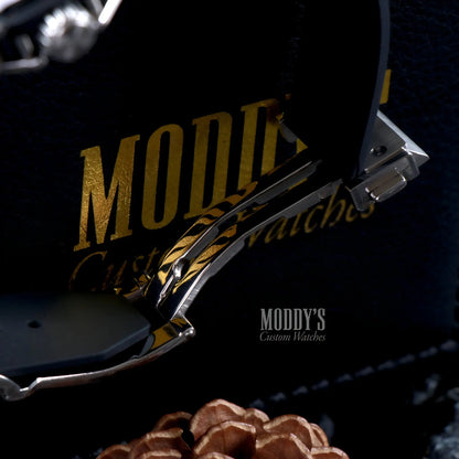 Hubleiko Big Bang Black gold black tiger stripe watch with silver accents and VK63 hybrid movement