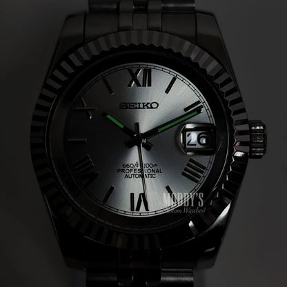Seiko NH35 automatic mod Datejust with silver dial and green accents