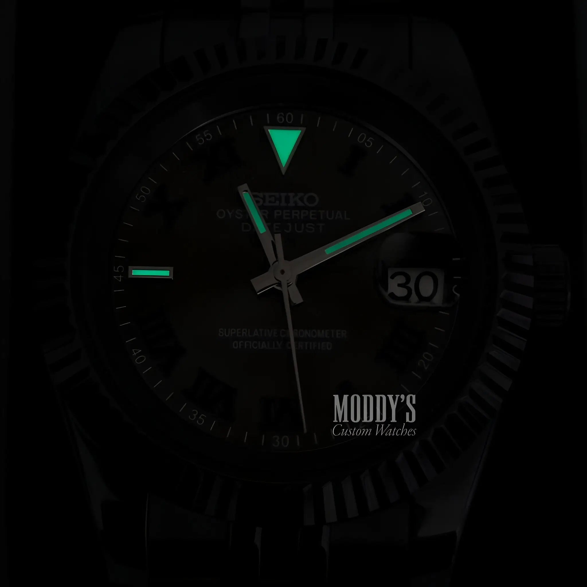 Seiko Prospex NH35 automatic watch with black dial and green lume