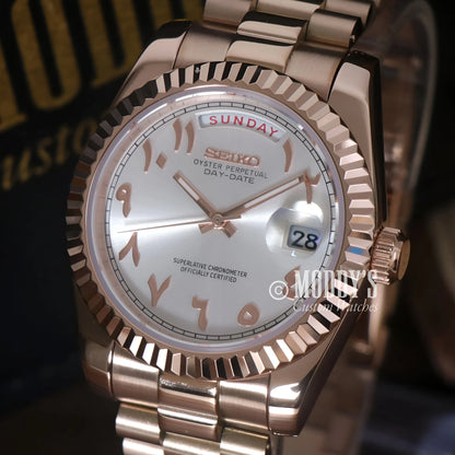Rose gold Seiko mod Day-Date watch with white dial and Roman numerals