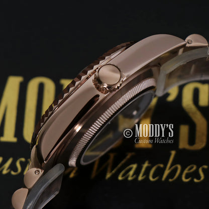 Seiko mod rose gold watch with black dial, silver accents, automatic movement