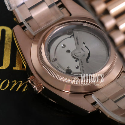 Seiko mod rose gold watch with 316L stainless automatic movement and transparent back