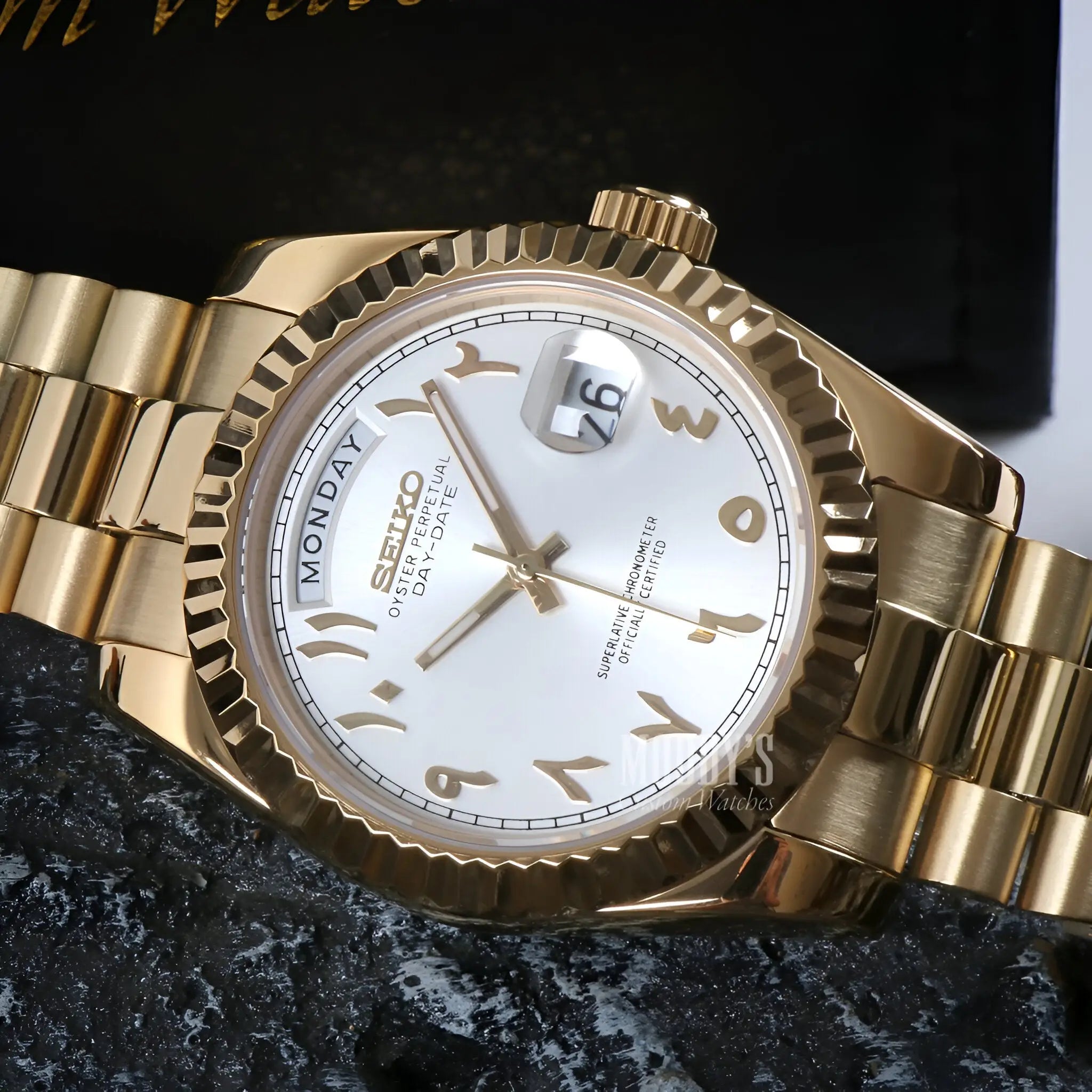 Gold Seiko mod watch with Arabic numerals, date, automatic movement