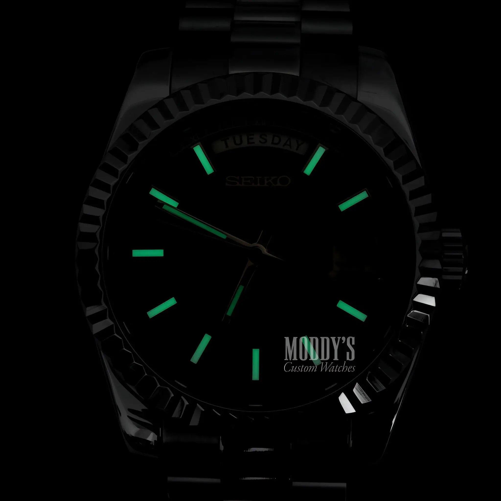 Seiko mod black luminous watch with green hands, 316L stainless steel band