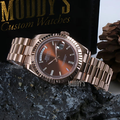 Rose gold Seiko mod Datejust with brown orange dial and automatic movement