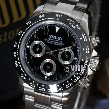 Seiko VK63 hybrid chronograph watch with black dial, silver accents, water resistance