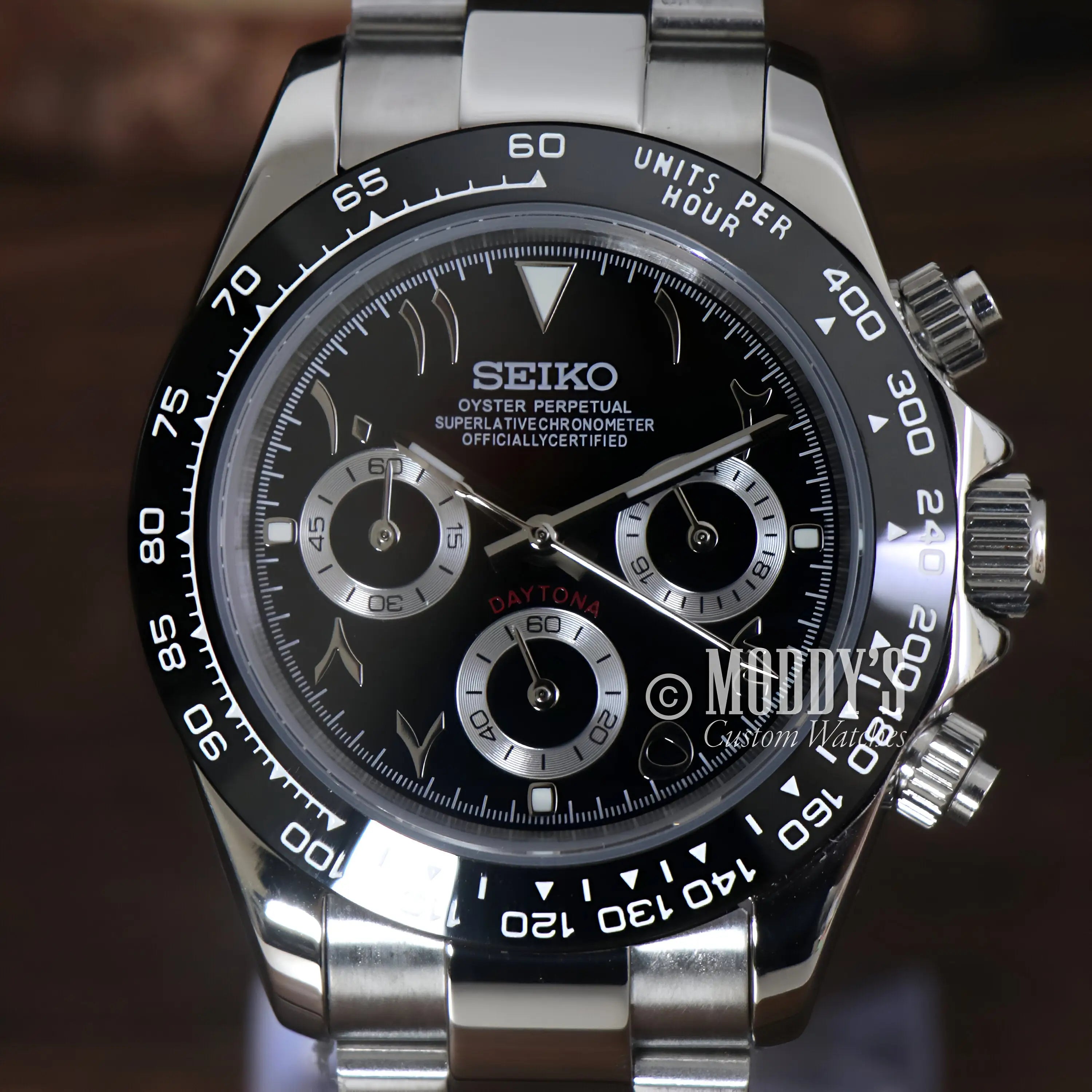 Seiko VK63 hybrid mod Daytona watch with black dial, silver accents, stainless steel band, water resistance, Seitona Arabic Black