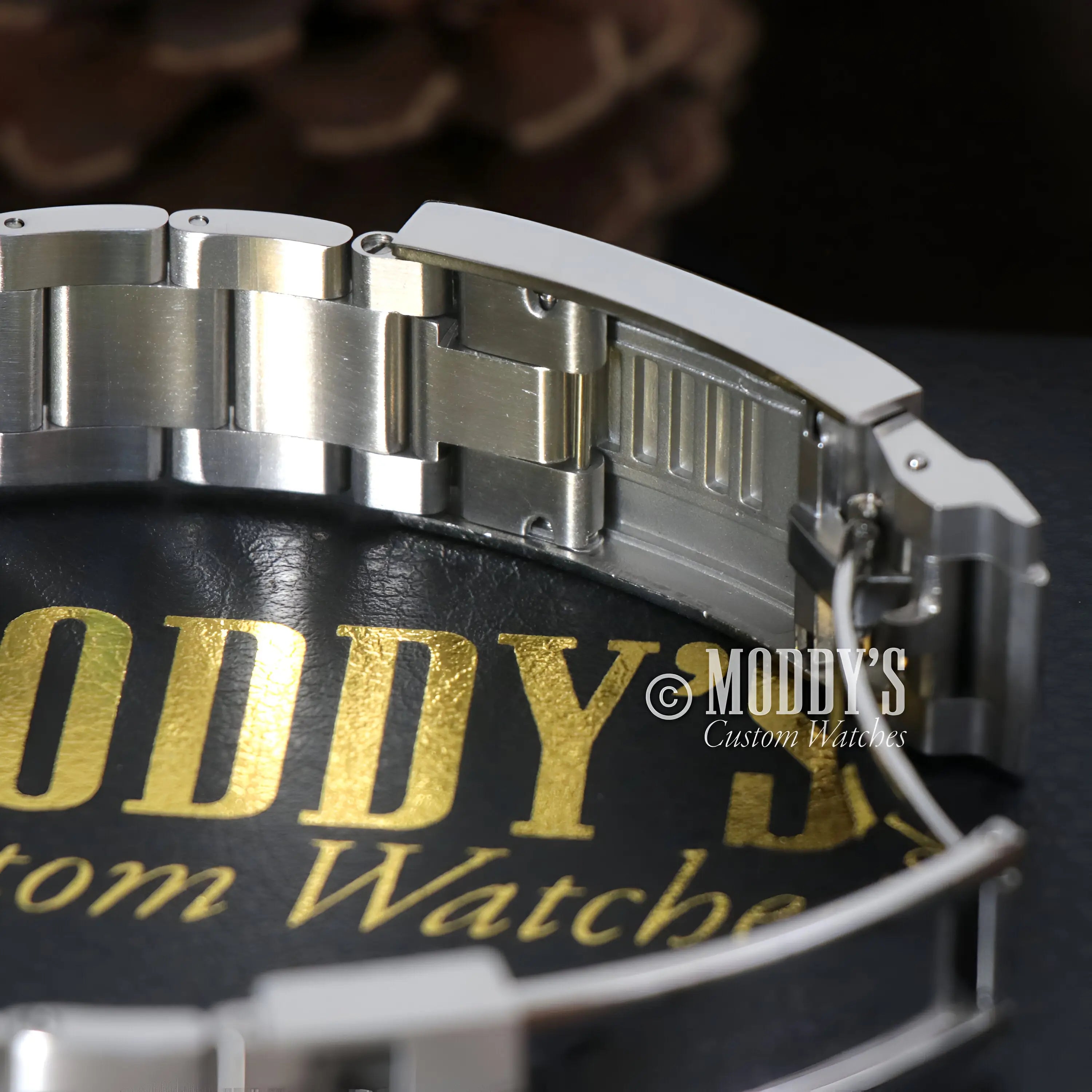 Seiko mod Daytona watch with stainless steel case, silver bracelet, black leather strap, water resistance