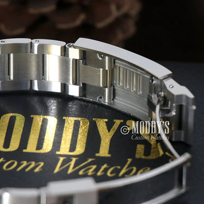 Seiko mod Daytona watch with stainless steel case, silver bracelet, black leather strap, water resistance