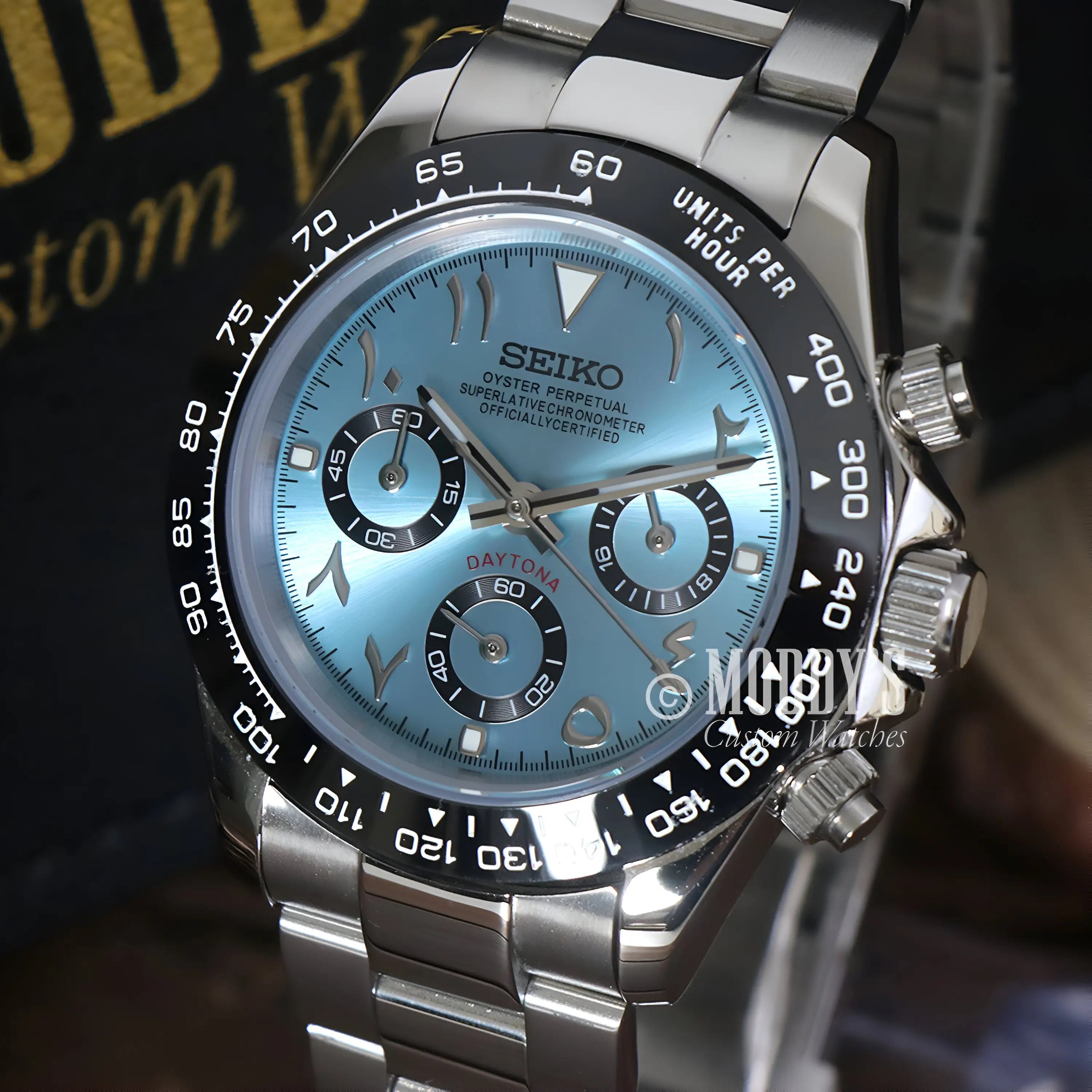 Seiko mod Daytona VK63 hybrid watch with blue dial, black bezel, water resistance
