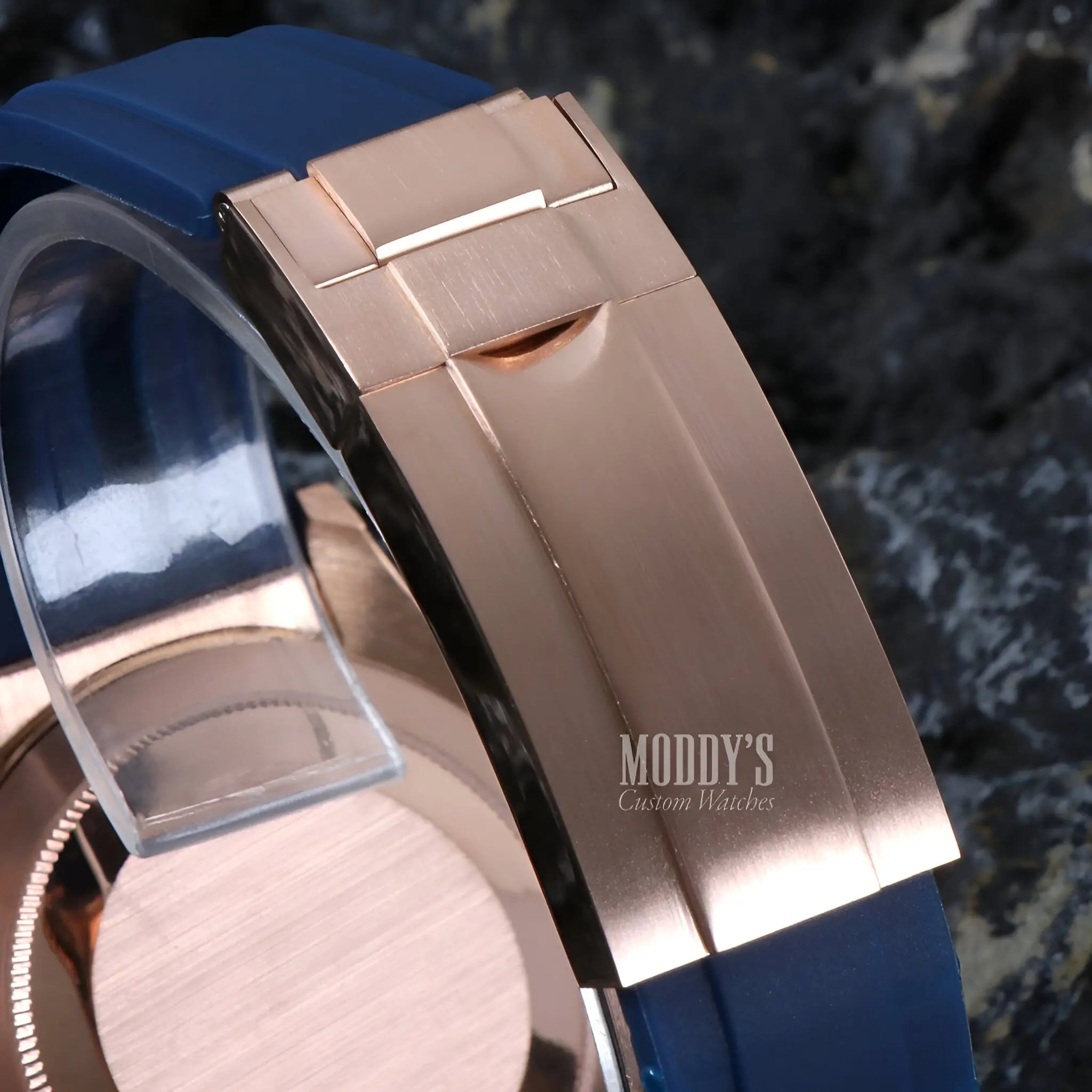 Seiko VK63 hybrid rose gold watch with blue rubber strap and silver buckle