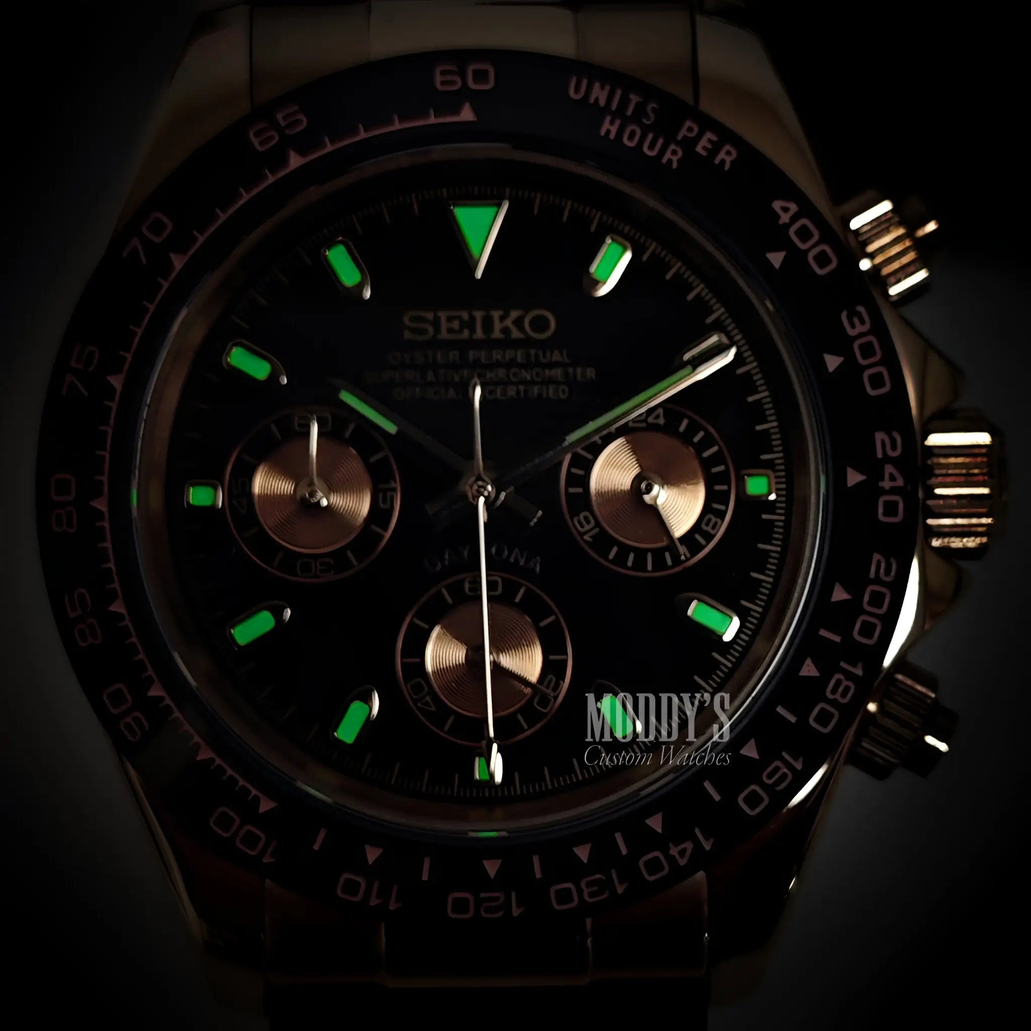 Seiko VK63 hybrid chronograph watch with black dial and green luminous markers