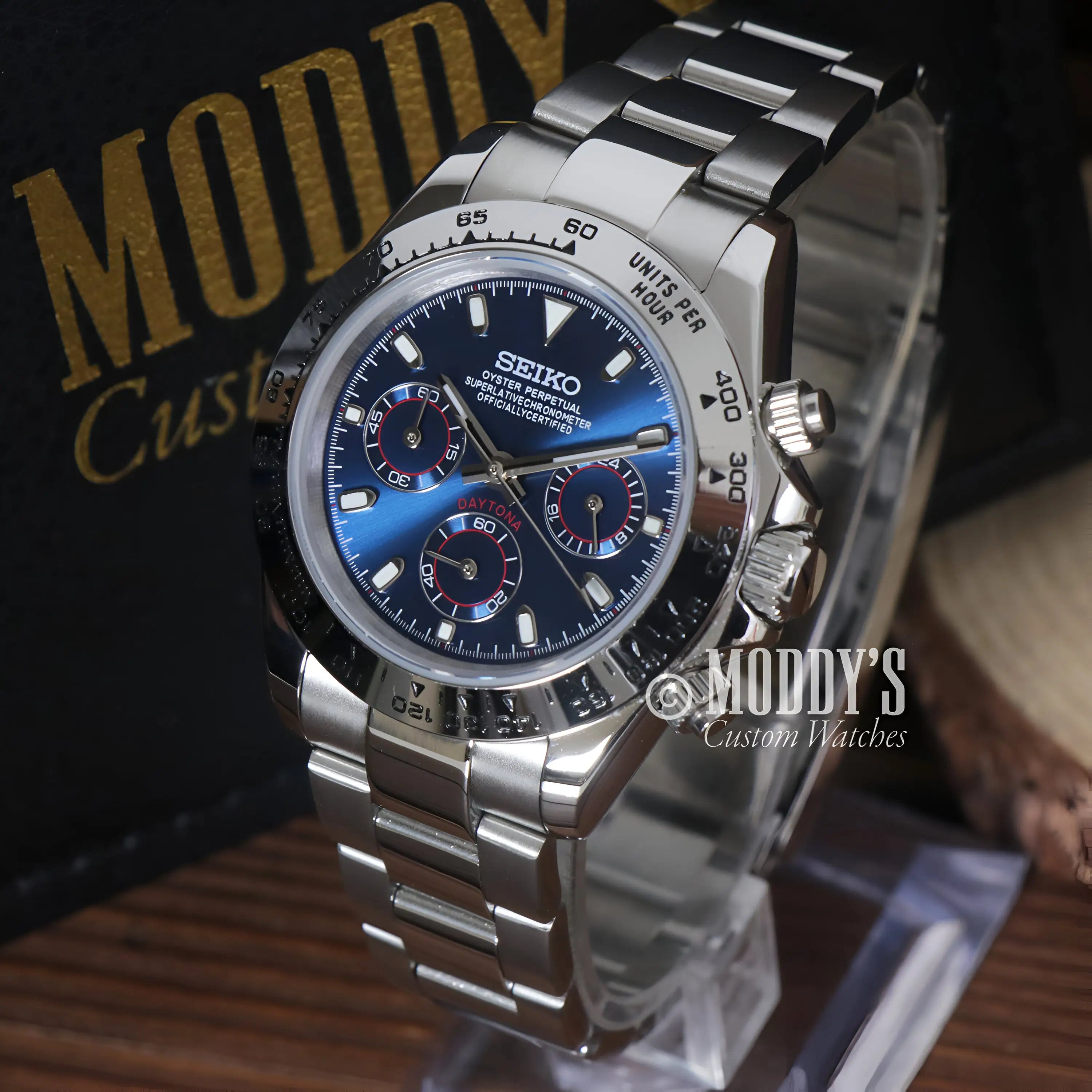 Seiko VK63 hybrid mod Daytona watch with blue dial and silver bracelet