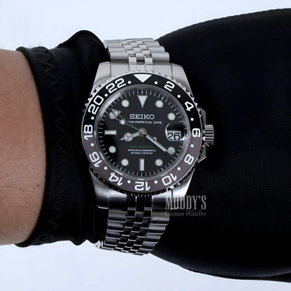 Seiko NH34 automatic GMT mod watch with black dial and bezel