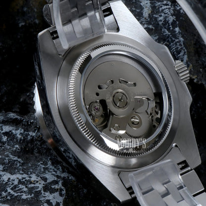 GMTeiko Bruce Wayne Seiko mod GMT watch with silver dial and black hands