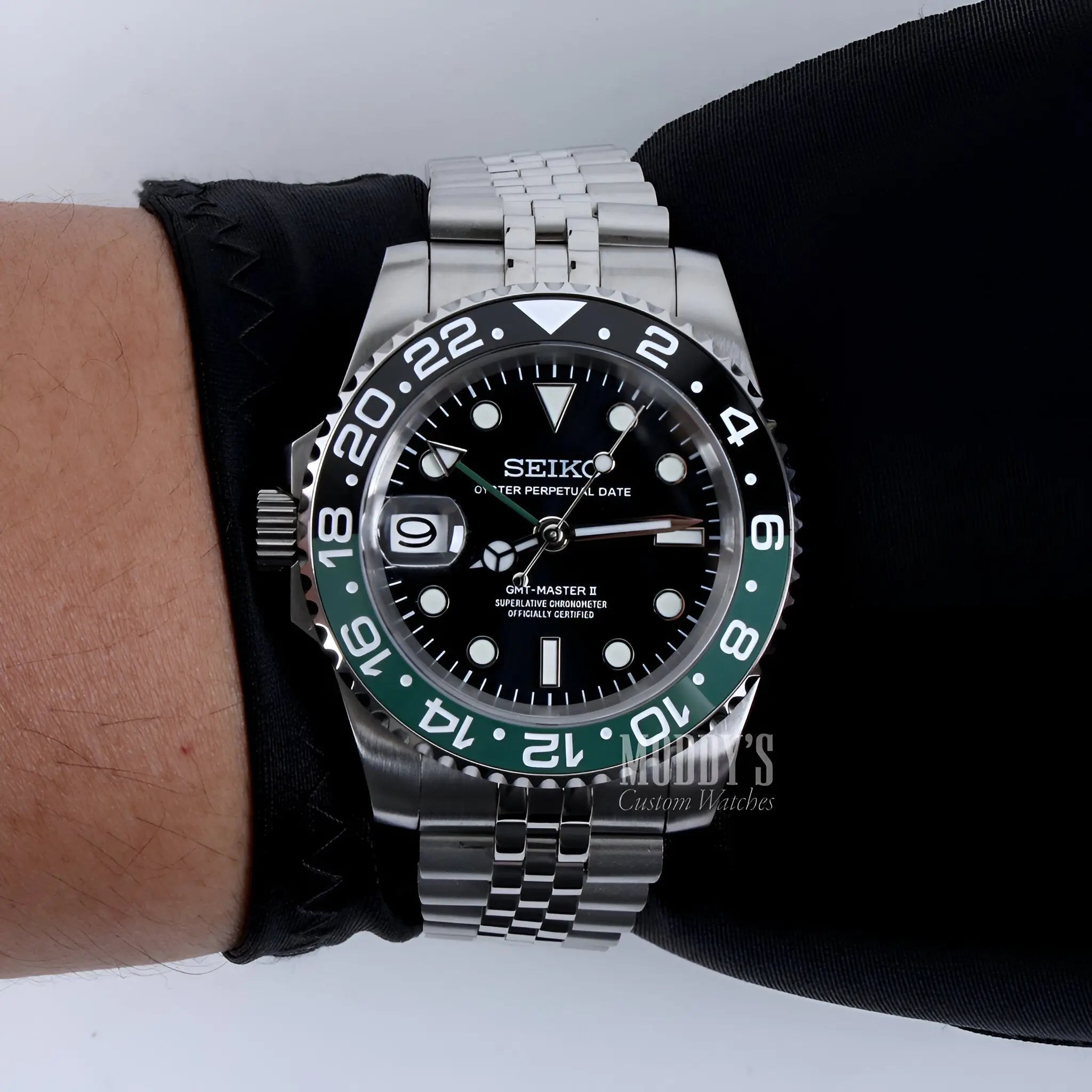 Seiko NH34 automatic mod GMT watch with black dial, green bezel