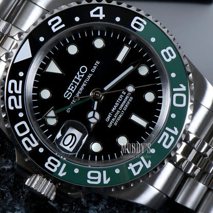 Seiko mod GMT with NH34 automatic movement, black dial, green bezel