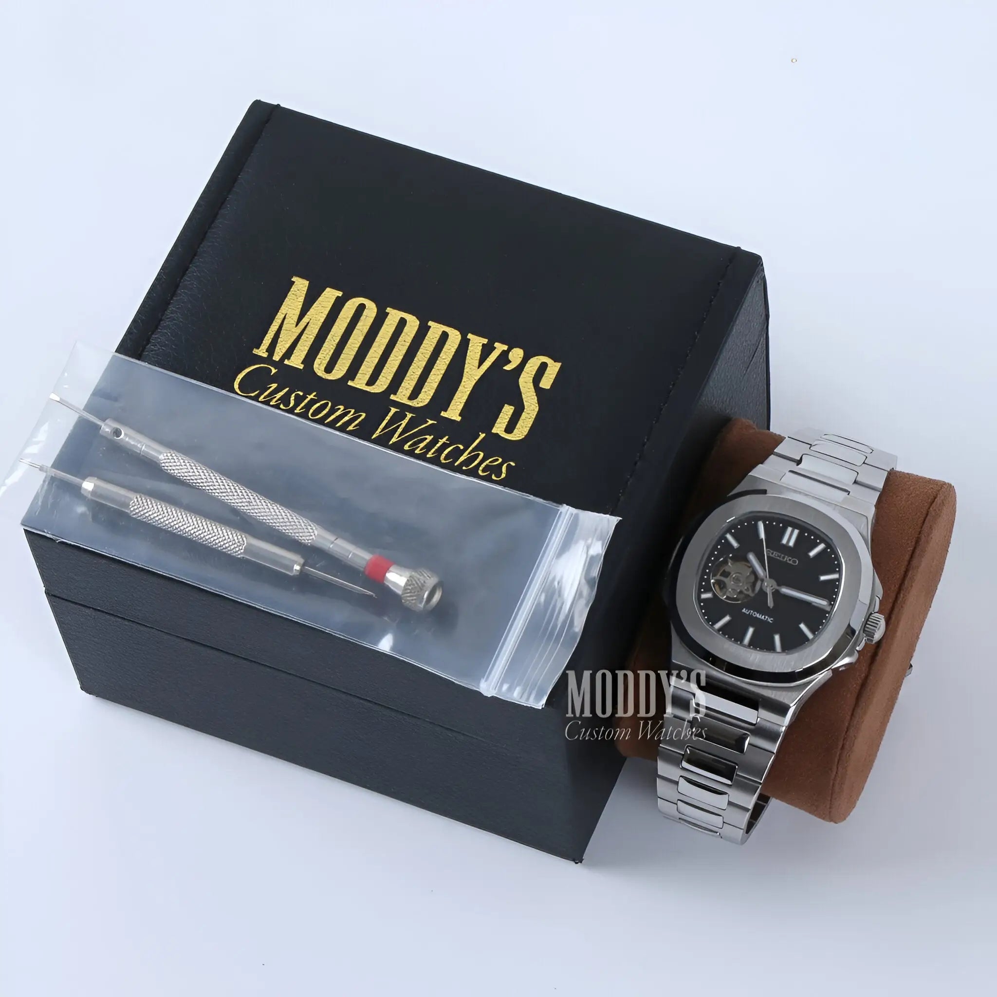 Seiko mod Nautilus watch with 904L steel case, black dial, brown strap