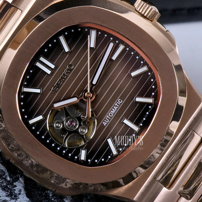 Rose gold Patek Philippe Nautilus watch with brown dial and silver accents