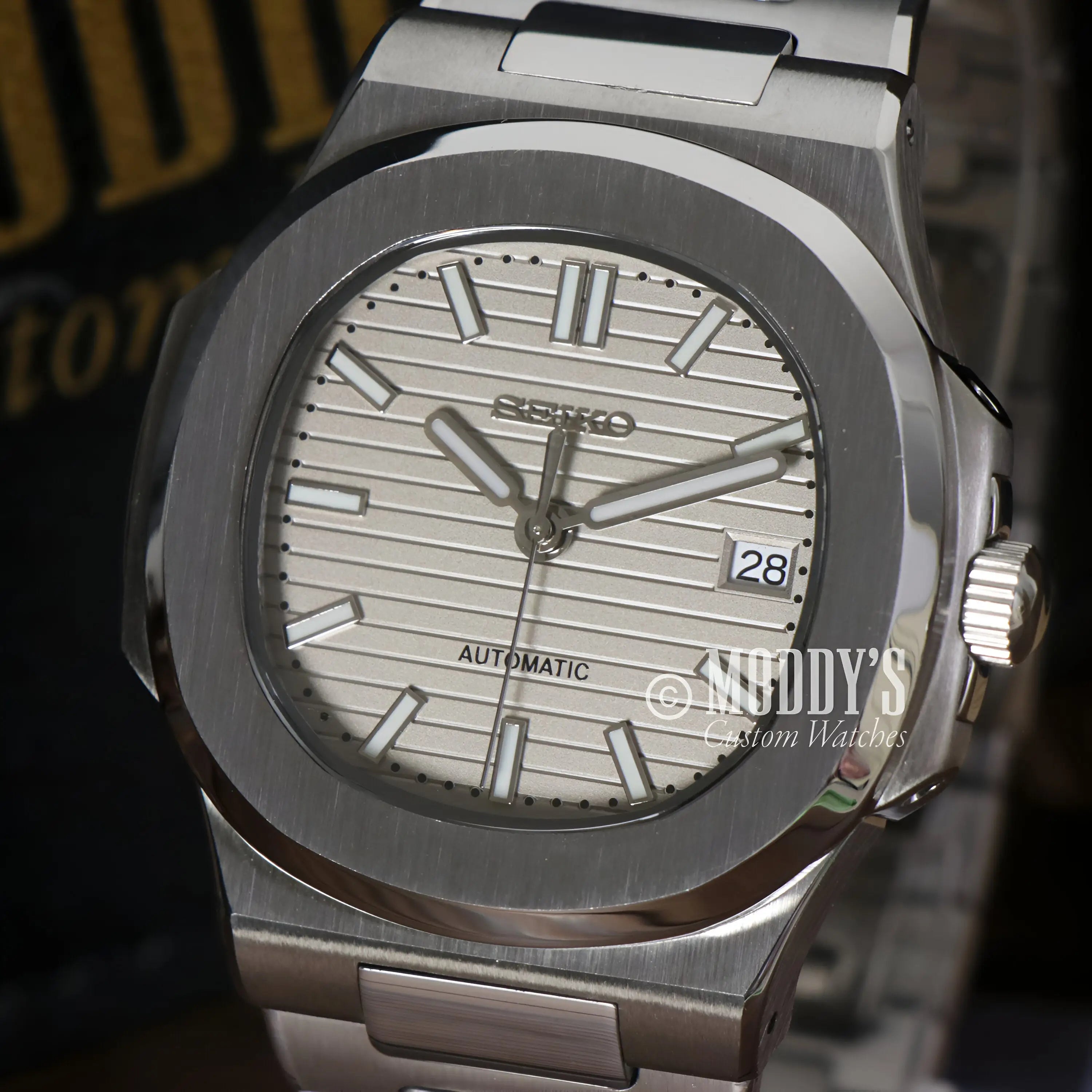 Silver Seiko NH35 automatic Nautiko Cream watch with date and steel band