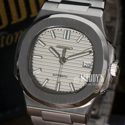 Silver Seiko NH35 automatic Nautiko Cream watch with date and steel band