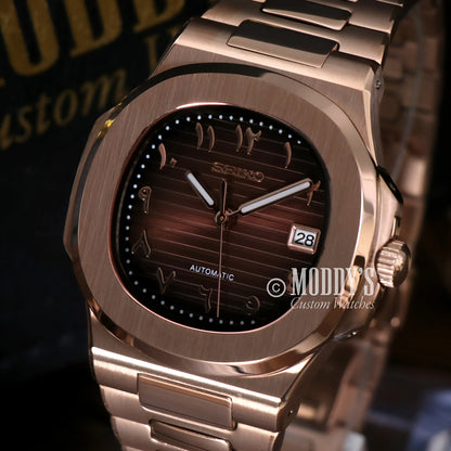 Rose gold Seiko mod Nautilus with NH35 automatic movement and wood dial
