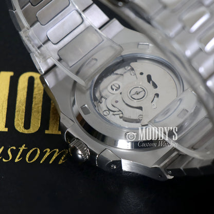 Seiko mod Nautilus watch in Arabic Tiffany Blue with 904L stainless steel case and transparent back revealing Seiko NH35 automatic movement