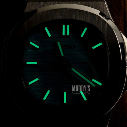 Luminous green Seiko mod Nautilus watch in Tiffany Blue with NH35 automatic and 904L steel