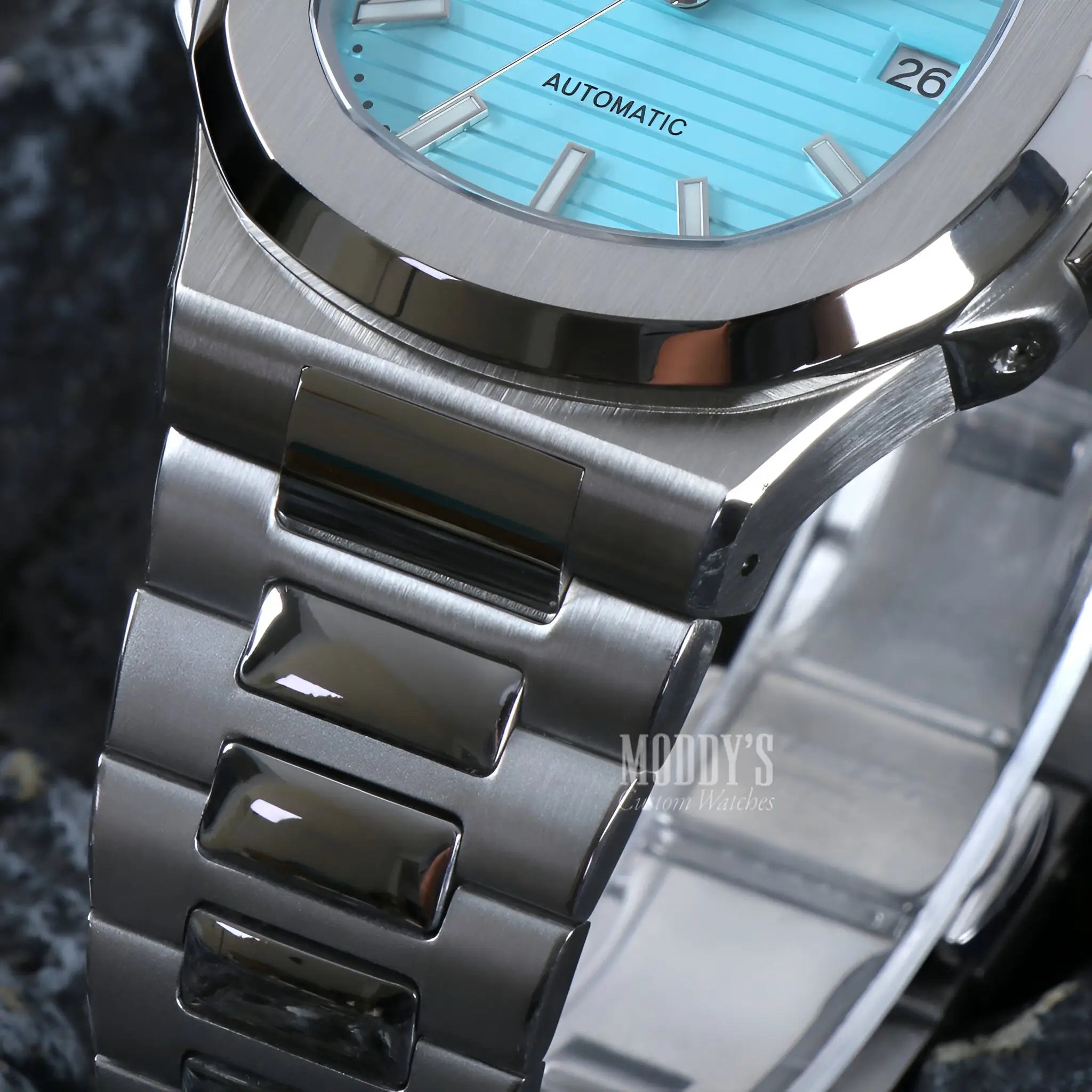 Seiko mod Nautilus watch in 904L stainless steel with turquoise dial
