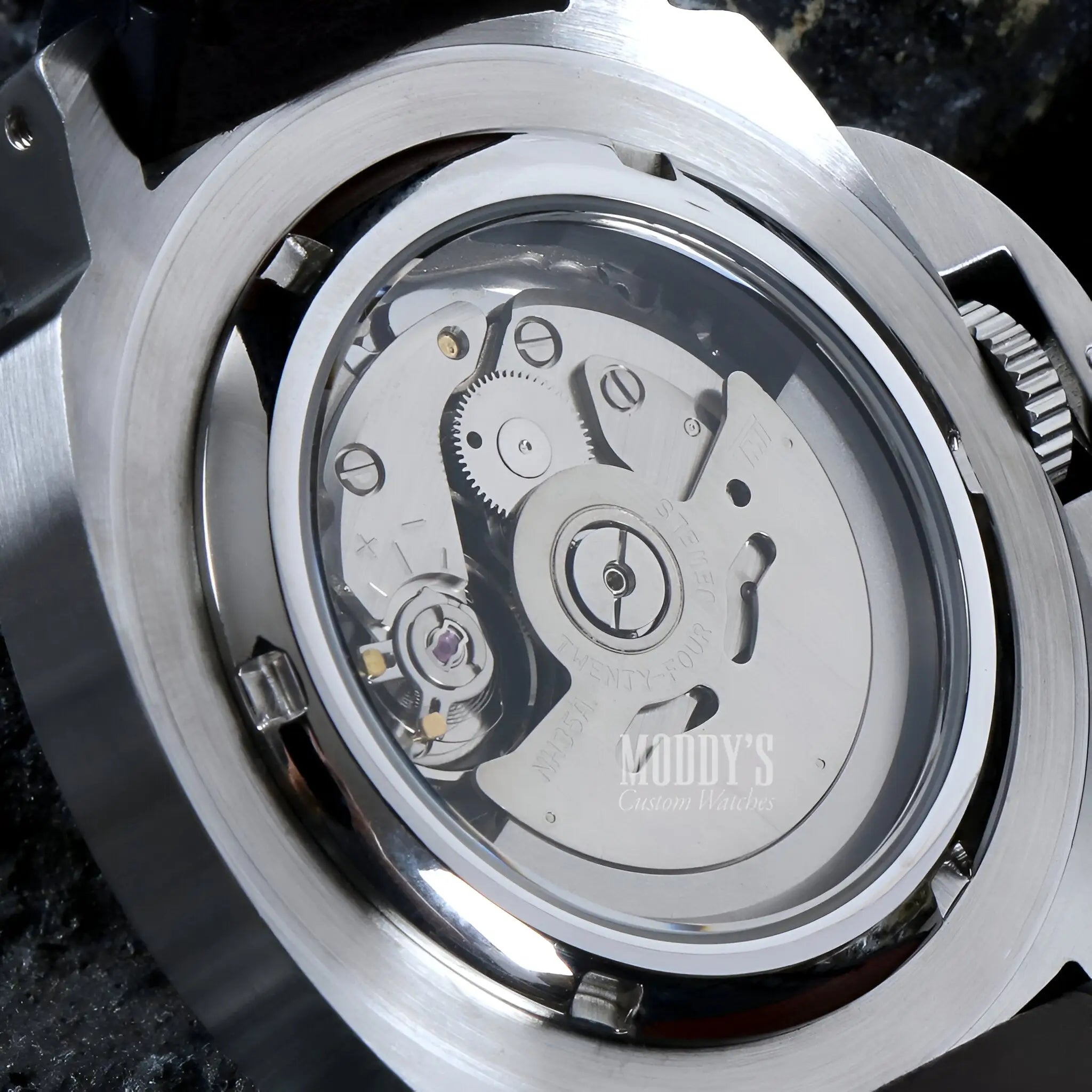 Seiko NH35 automatic silver watch with transparent face and rotating bezel