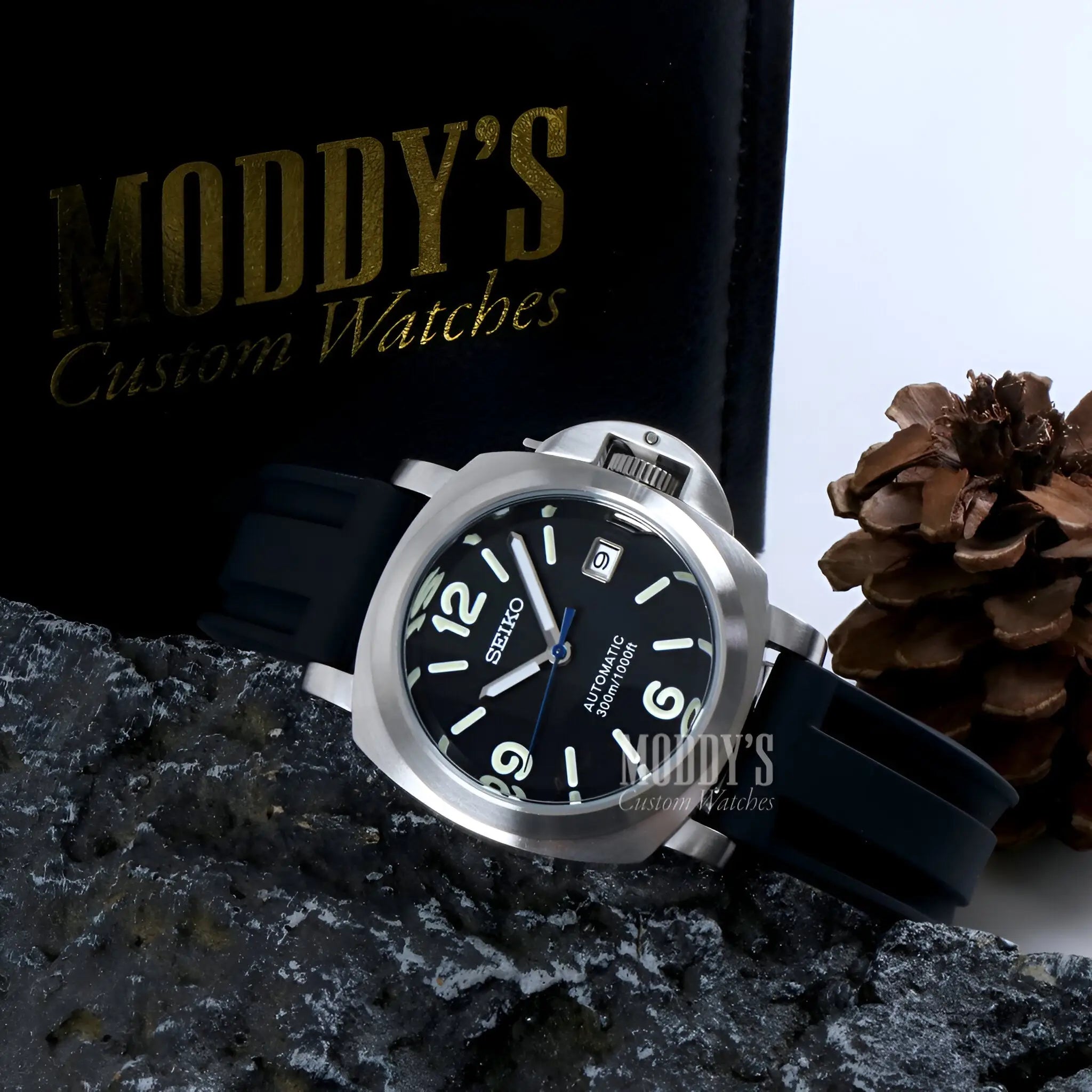 Seiko NH35 automatic watch with black dial, silver case, rubber strap