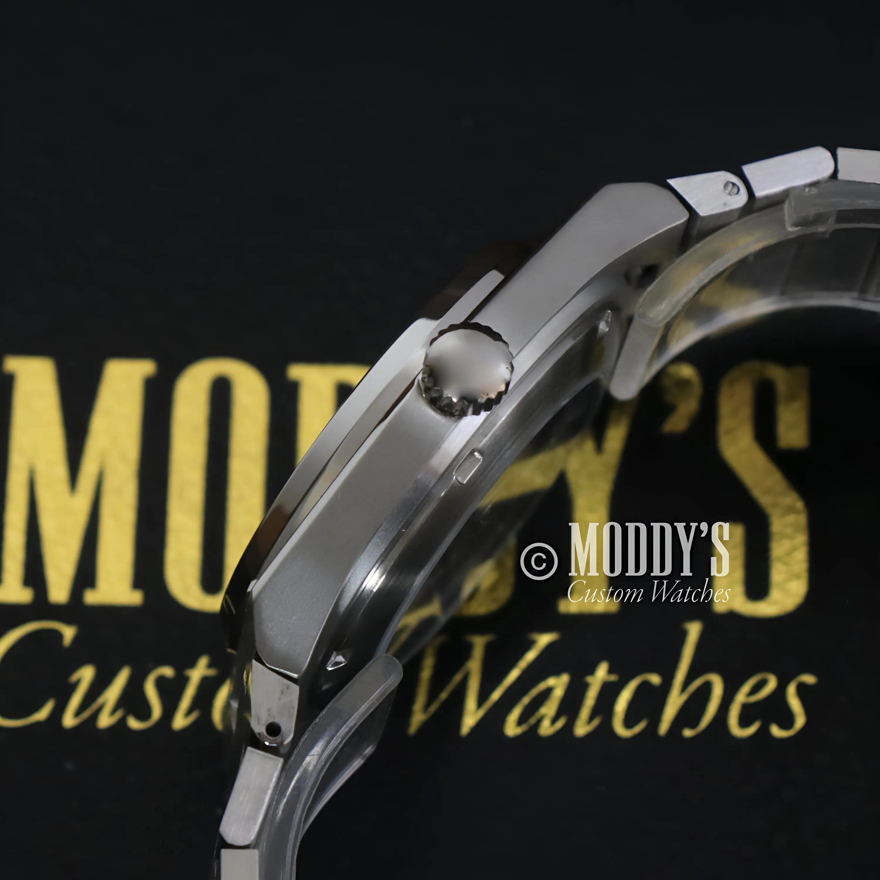 PRXeiko Black Seiko mod with silver stainless steel band and NH35 automatic