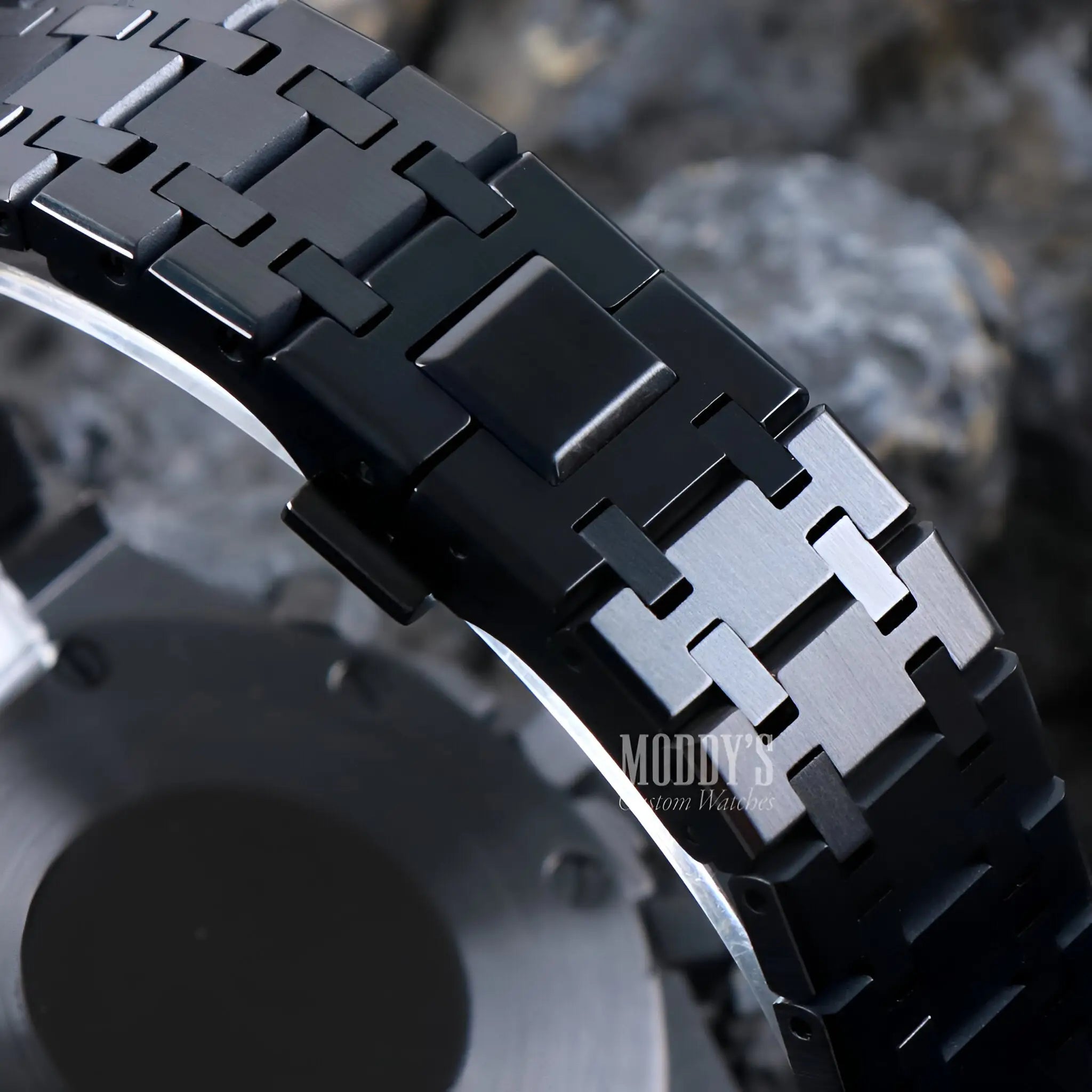 Royal Seikoak Triple Black watch with black stainless steel woven band and silver accents