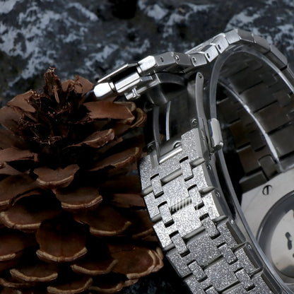 Royal Seikoak White Iced Out watch with Seiko NH35 automatic movement on pinecone background