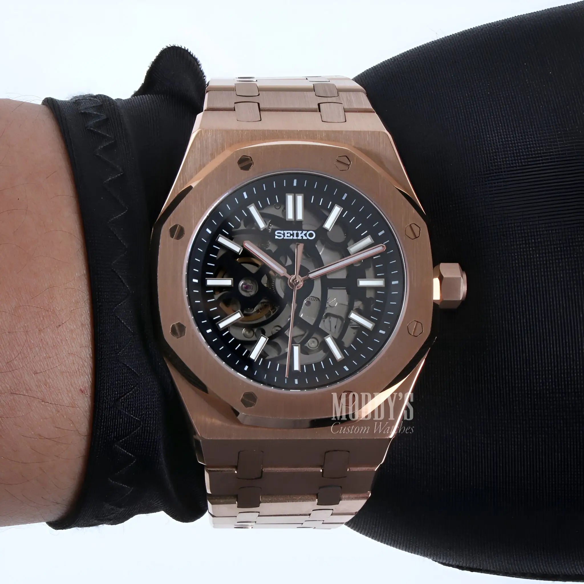 Rose gold Royal Seikoak Seiko NH70 automatic watch with black skeleton dial
