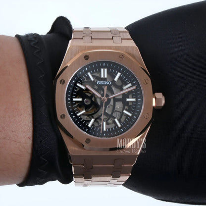 Rose gold Royal Seikoak Seiko NH70 automatic watch with black skeleton dial