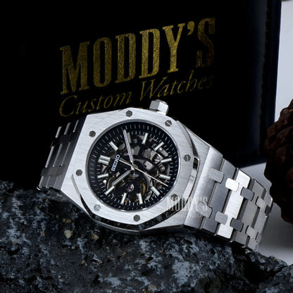 Stainless steel Seiko mod Royal Oak watch with black dial, skeletonized Seiko NH70 automatic movement and royal oak water resistance