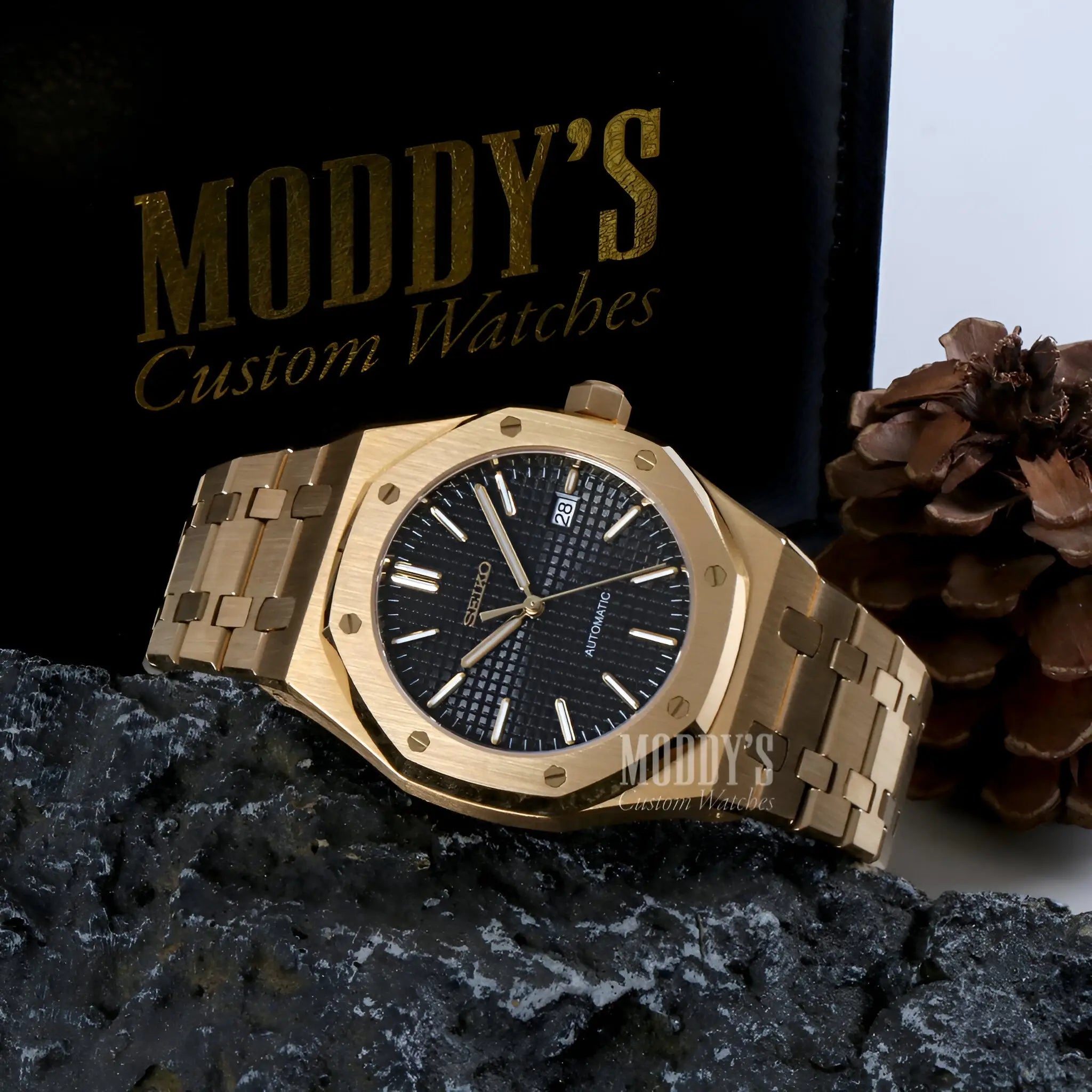 Iconic Royal Oak mod: yellow gold Audemars Piguet watch with black dial