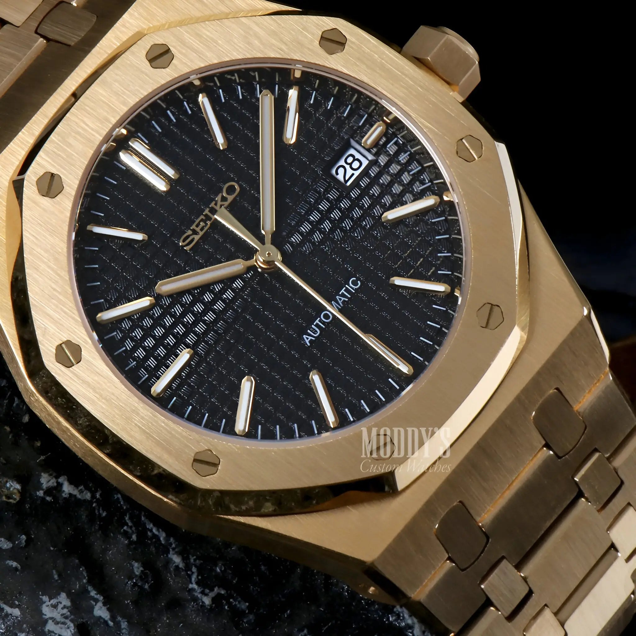 Gold and black Seiko NH35 automatic Royal Oak mod watch with textured dial