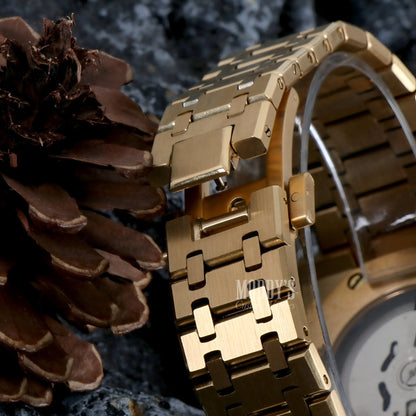 Royal Seikoak Yellow Gold watch with interlocking stainless steel band