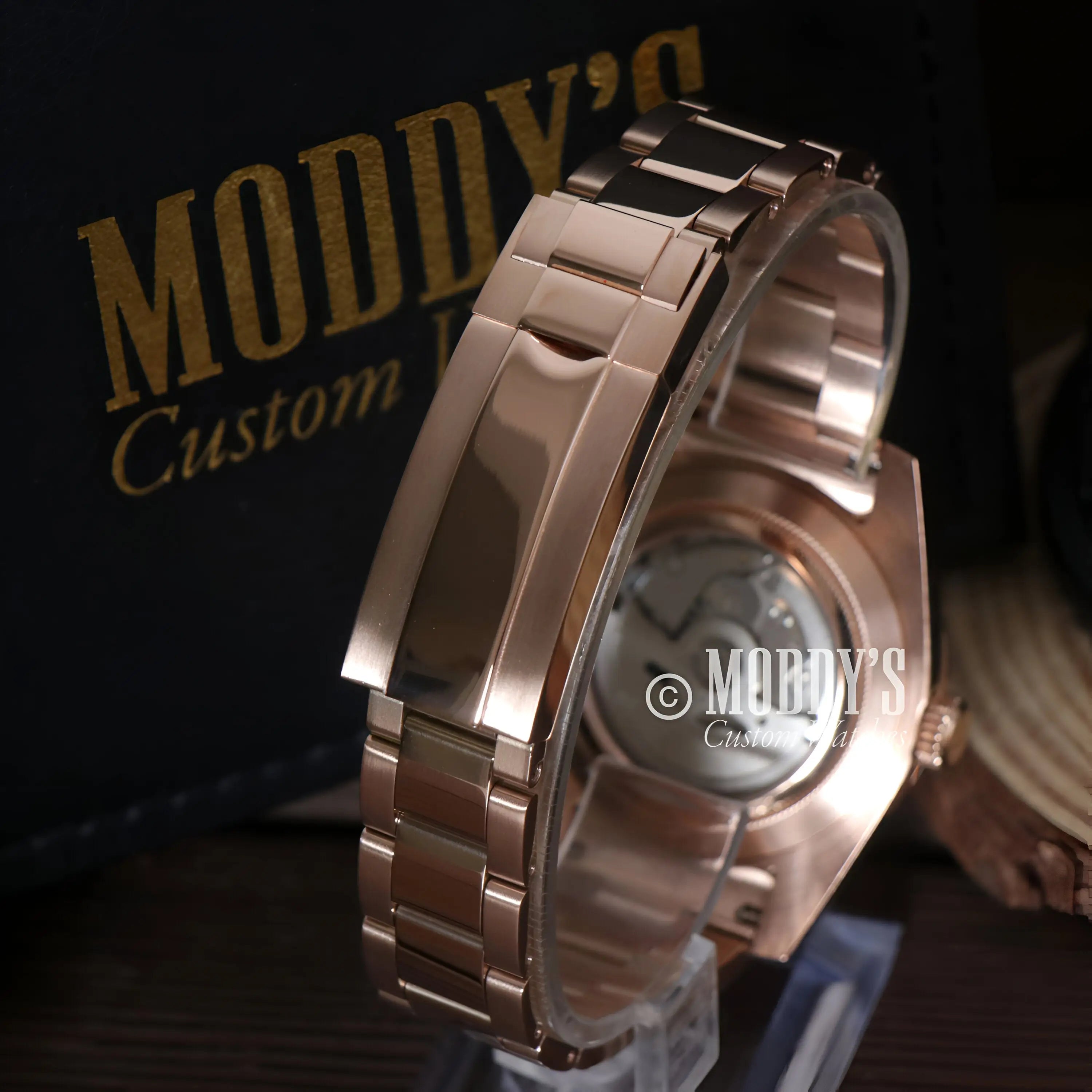 Seiko Sky Dweller rose gold watch with diamond accents and sleek design