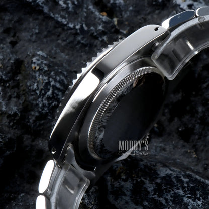 Seiko mod submariner vintage watch with silver stainless steel case, black dial, luminous hands