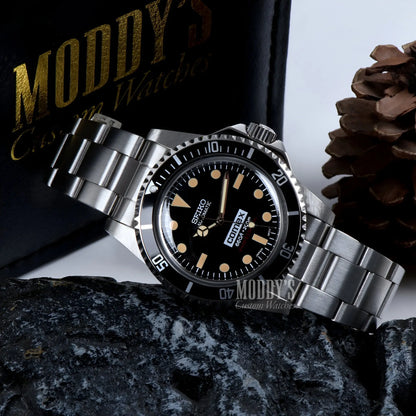 Vintage Seiko mod Submariner diver’s watch in black and gold