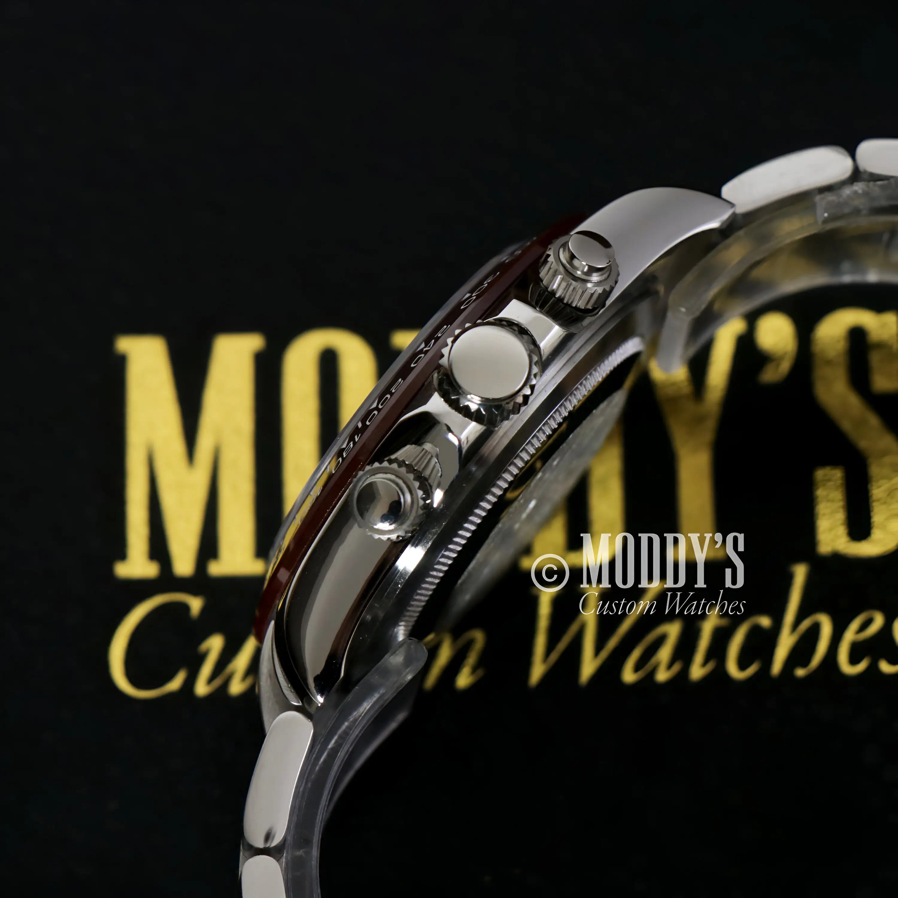 Seiko mod Daytona stainless steel watch with black dial and red accents