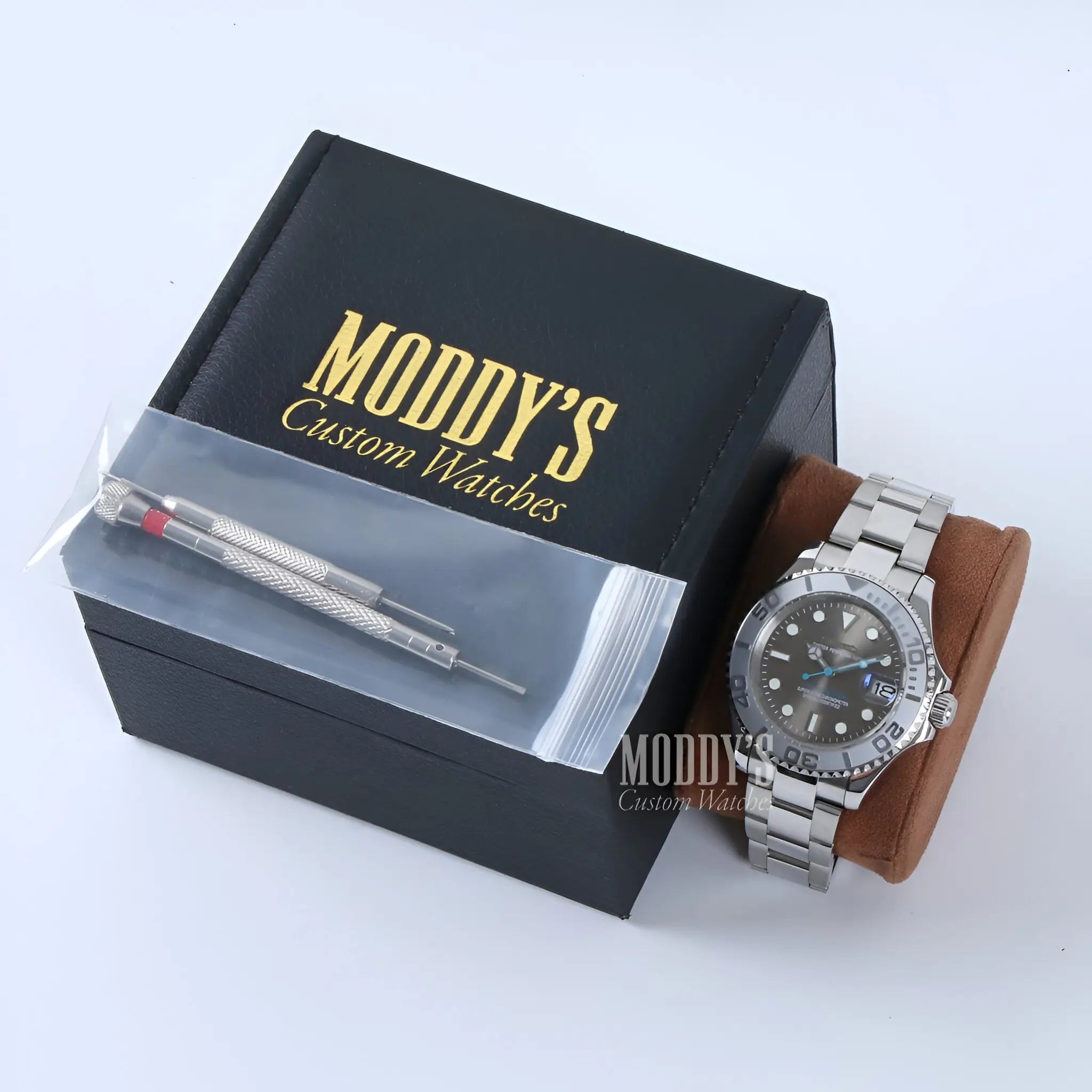 Silver Seiko Mod Yacht-Master watch with black dial and brown leather strap