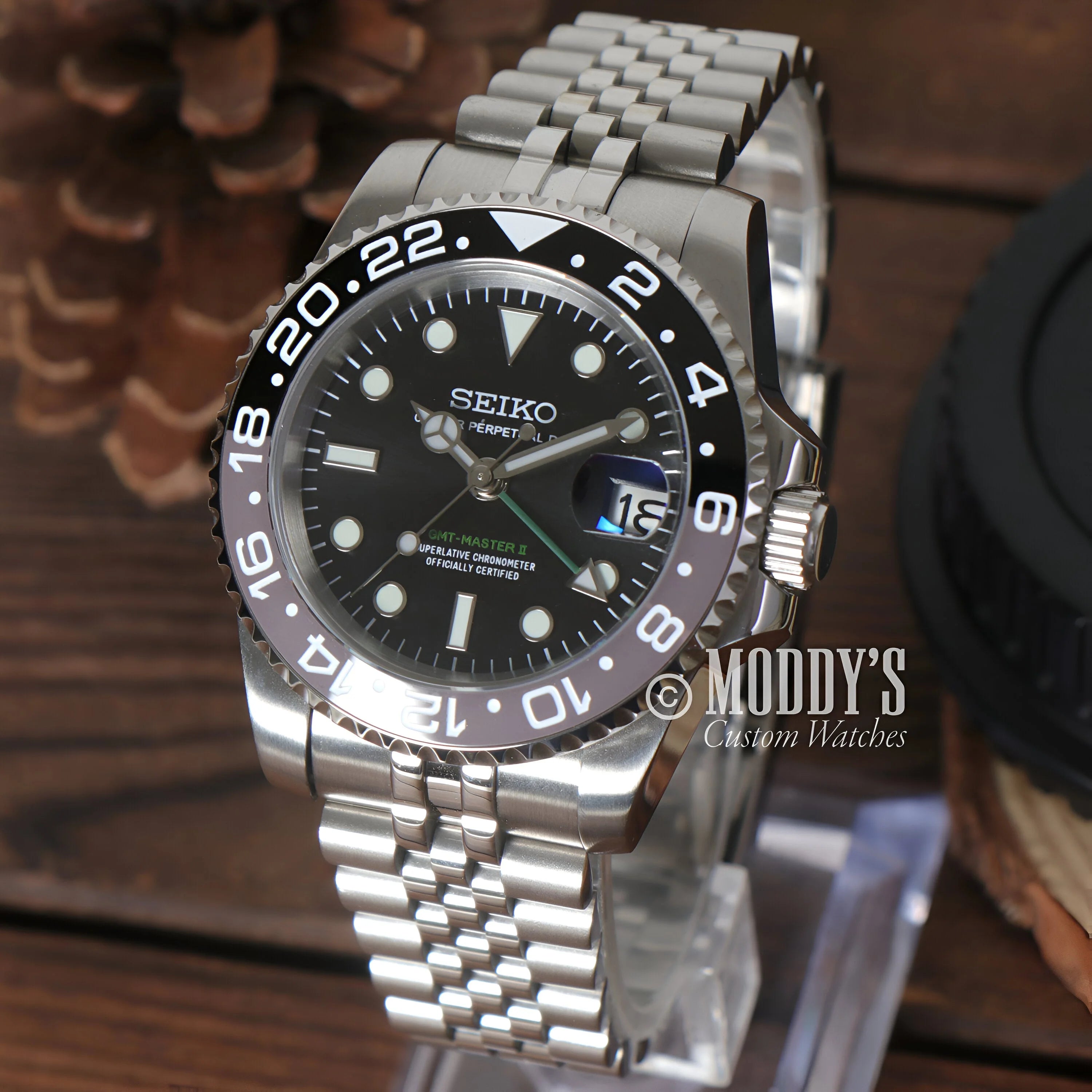 Seiko dive watch with black dial and 904L stainless steel jubilee bracelet, GMTeiko Bruce Wayne