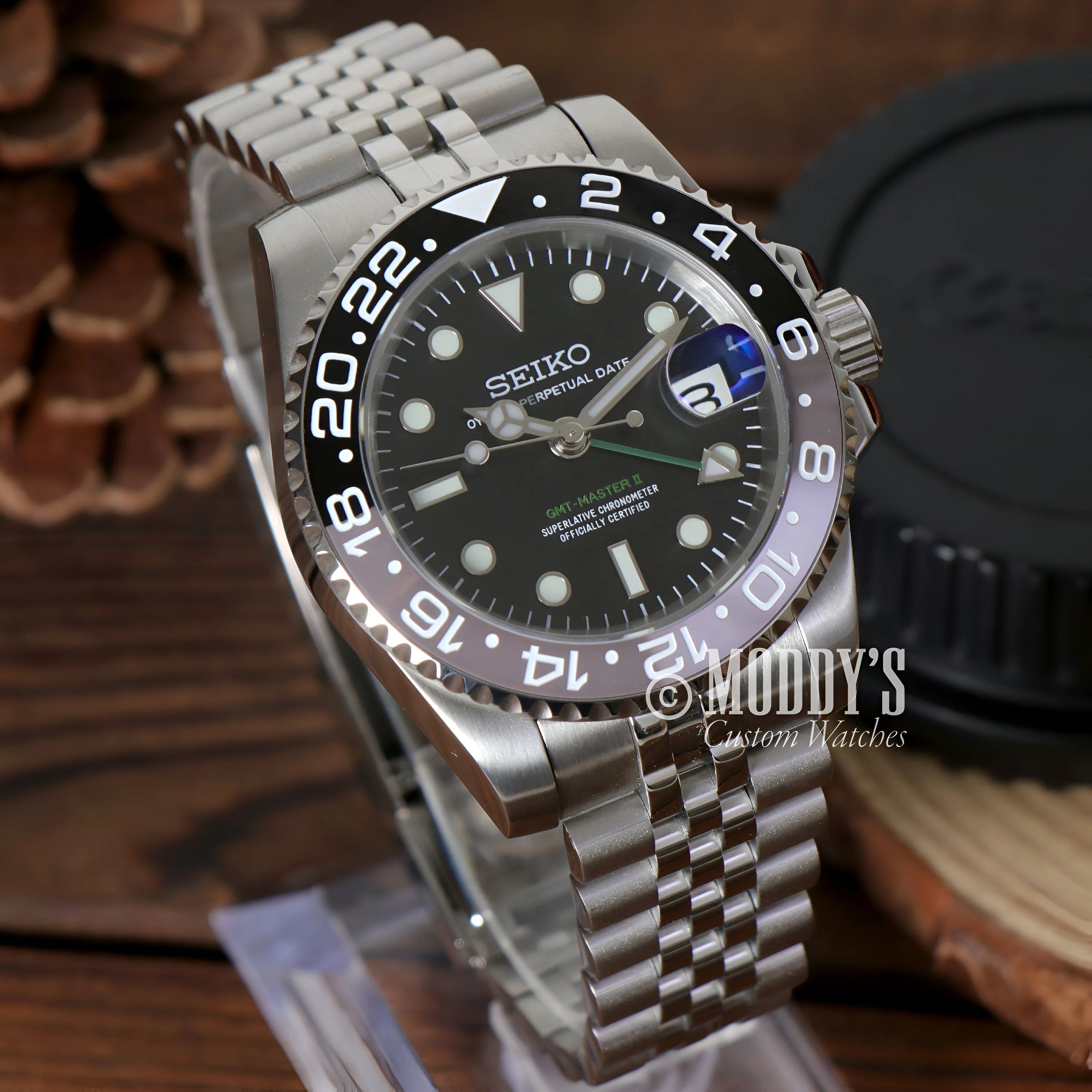 Seiko dive watch with black bezel, 904L stainless steel jubilee bracelet, automatic movement