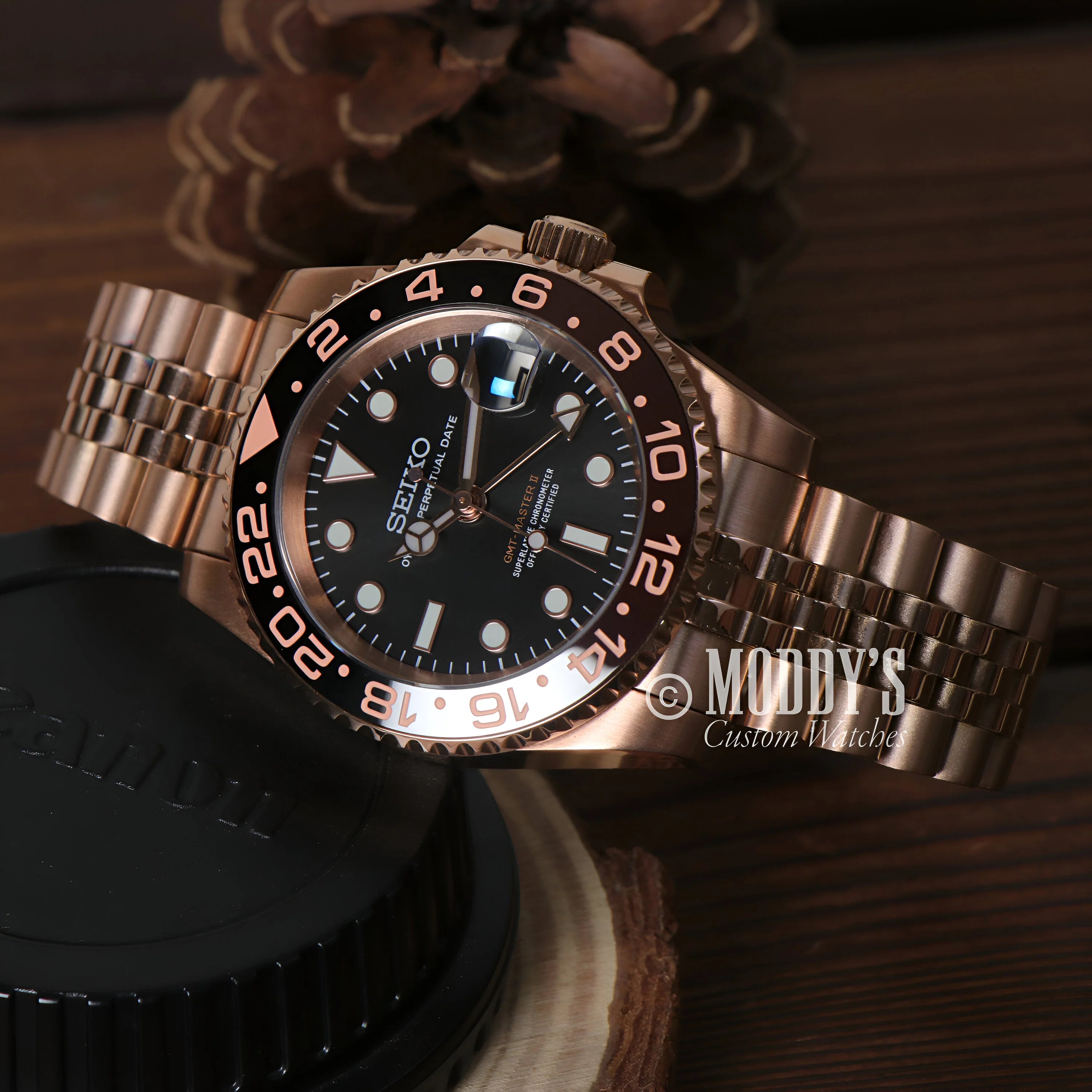 Rose Gold Seiko dive watch with black bezel and dial in GMTeiko Rootbeer case