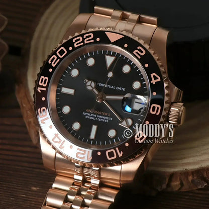 Rose gold wristwatch with black dial, GMTeiko Rose Gold Rootbeer, Seiko NH34 automatic