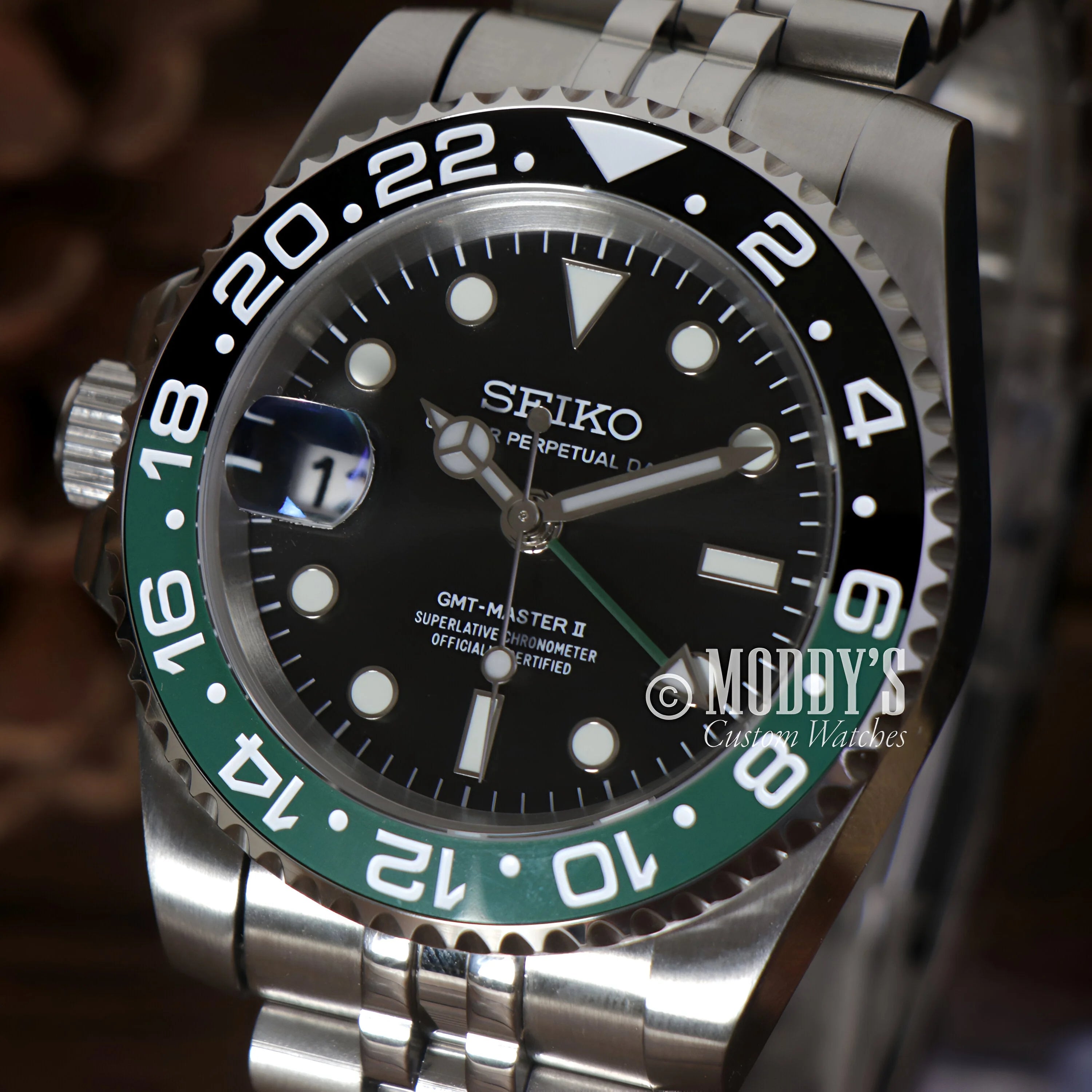 Seiko Mod GMT with black dial and green/black bezel in GMTeiko Sprite design